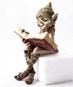 Pesky Pisky Sitting on a Shelf