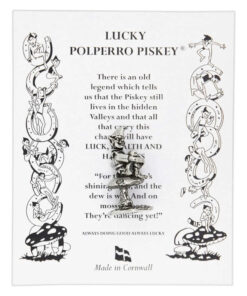 A pewter lucky Cornish pisky seated on a mushroom. The pisky wears a pointed hat and has a playful expression, capturing a whimsical and enchanting essence