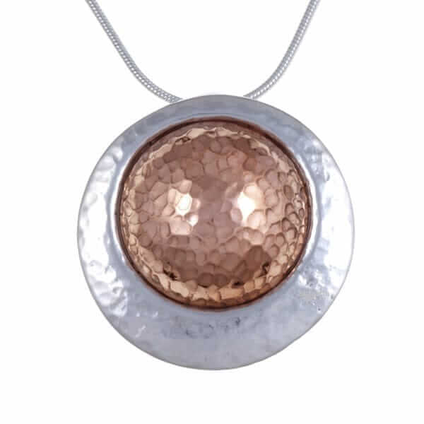 Copper offset disc on snake chain – Hammered pewter disc with convex, hammered copper centre on tin-plated snake chain.
