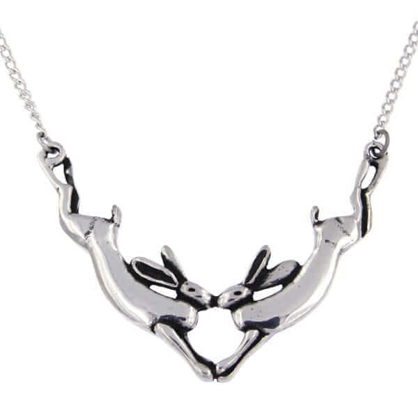 Kissing hares necklace – this necklace depicts two leaping hares joined together in a kiss. Comes on an 18″ tin-plated or surgical steel curb chain.