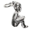 Sterling silver delightful Cornish Piskie charm in a seated position.