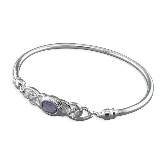 Stunning celtic knotwork design 925 sterling silver bangle, set with a oval shaped amethyst gemstone.