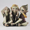 Three pesky Cornish Piskies sitting together reminiscent of the "see no evil, hear no evil, speak no evil" motif.