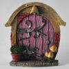 Cornish Pisky fairy tale-inspired door. Painted in a charming purple hue, the door is adorned with intricate details,