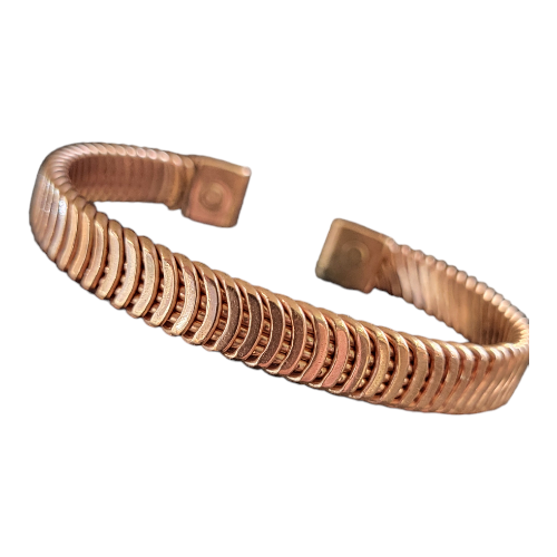Magnetic copper therapy bracelet in an open cuff design, featuring a distinctive ridged and grooved diagonal pattern, crafted from solid copper with magnets embedded at each end for potential arthritis relief, improved circulation, and overall wellness benefits.