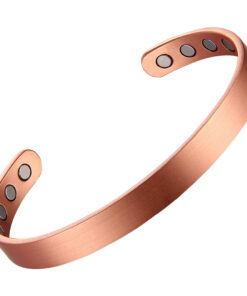 A narrow copper open cuff bangle with a smooth, brushed matte finish for a sleek and minimalist look. The interior is fitted with multiple round inset magnets—four on each end—combining understated style with potential magnetic therapy benefits.