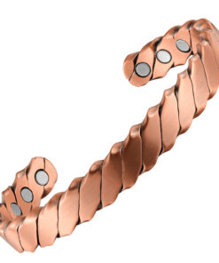 A copper open cuff bangle with a distinctive twisted chevron-link design, giving it a bold and textured appearance. The inside surface is smooth and fitted with multiple round inset magnets near each end, combining striking geometric style with potential magnetic therapy benefits.