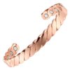 A copper open cuff bangle with a polished, twisted rope-link design that creates a bold, reflective surface. The interior is smooth and fitted with multiple round inset magnets near each end, combining an eye-catching braided style with potential magnetic therapy benefits.