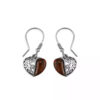 Pair of sterling silver heart-shaped earrings with amber gemstone inlay and decorative swirl detailing.