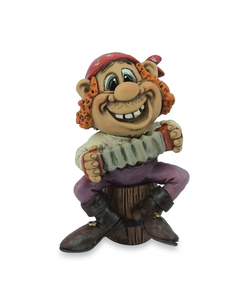 Cornish pirate figurine with red bandana playing a concertina accordion