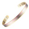 A tri-tone multi-band bio magnetic copper cuff bracelet displaying three parallel metallic stripes of polished gold, brushed silver, and warm rose gold, with three circular therapeutic magnets embedded on the inner surface of each open end against a white background.