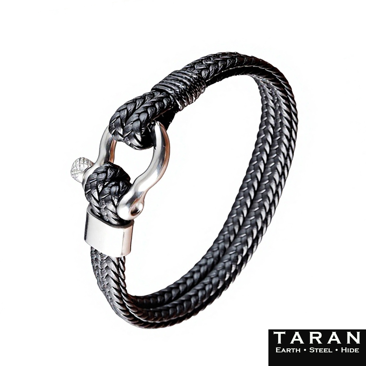 A Taran men's bracelet featuring a multi-strand black braided leather band and a polished silver steel shackle clasp, isolated on a clean white background. Includes the 'TARAN Earth Steel Hide' brand logo in the bottom right corner.