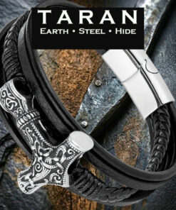 A Taran men's multi-strand bracelet featuring a combination of smooth, braided, and cord-wrapped black leather bands. The centerpiece is a silver-toned Thor's Hammer (Mjolnir) intricately engraved with Norse scrollwork, shown on a plain white background with a polished steel magnetic clasp.
