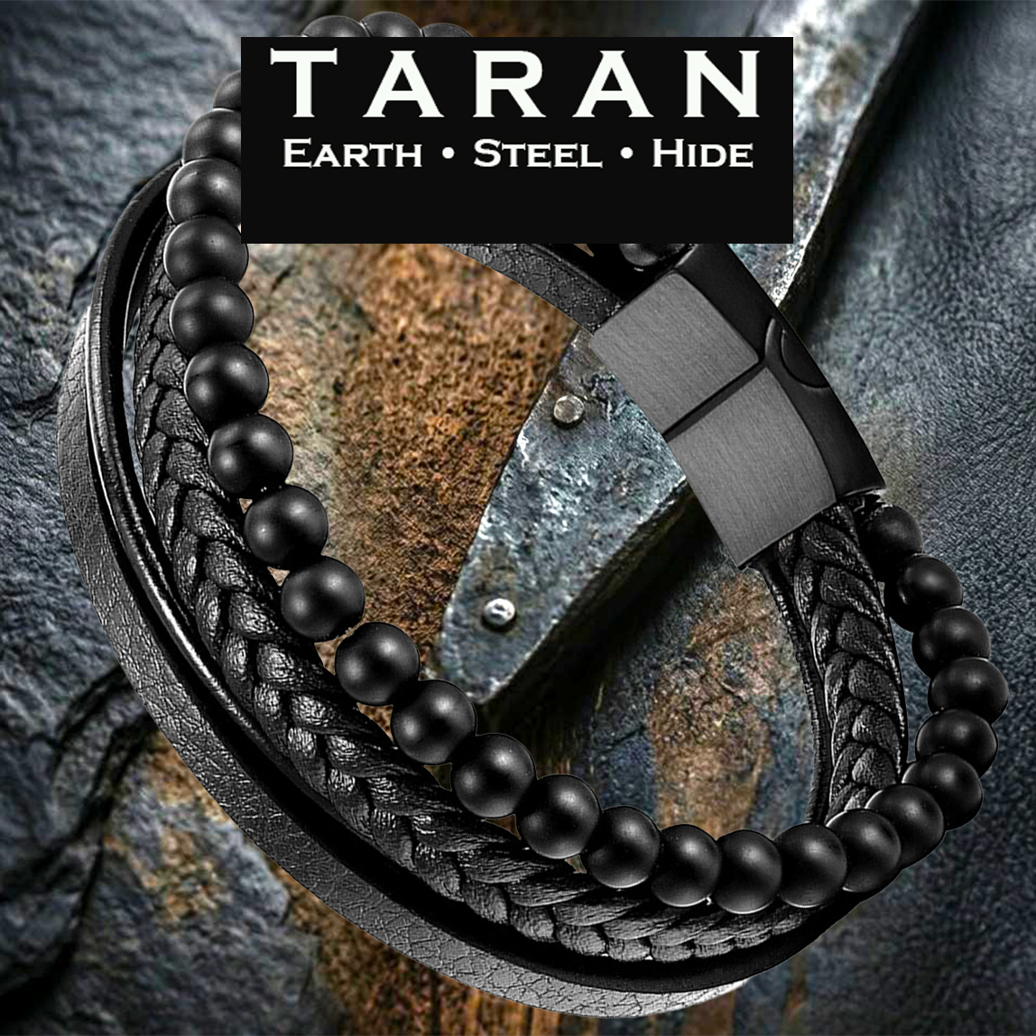A Taran men's black leather and bead multi-strand bracelet featuring a pre-stacked tri-texture layout. The design includes a row of matte black onyx-style beads, a central cord of tightly woven black braided leather, and a flat grain-textured leather band. The strands are secured by a geometric, two-tone brushed gunmetal and matte black magnetic stainless steel clasp,