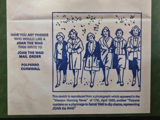 Vintage blue ink sketch of six 1930s Polperro maidens walking in coats, reproduced from a Western Morning News photo titled Polperro maidens on a pilgrimage to Saints' Well to dip charms representing Joan the Wad.